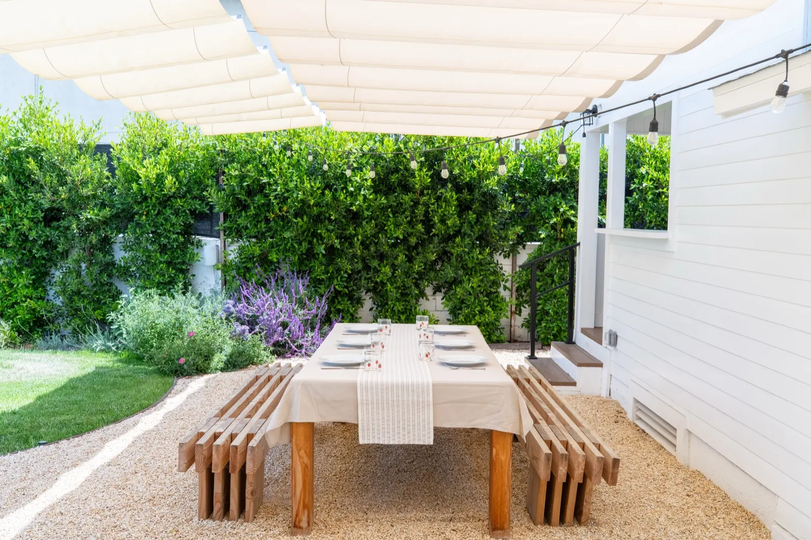 Shaded outdoor dining area with canopy